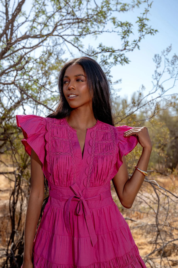 fuschia mini dress Madelyn in Ritzy Row Women's Elegant global-description_tag-The Clove mini dress in chiffon. A plunging V-neckline balanced by long floaty sleeves. Floral print lifted from the 1970s. The kind of dress you’ll reach for when you need a one-and-done outfit. Wear it on your next vacation. Wear Color:TANGERINE